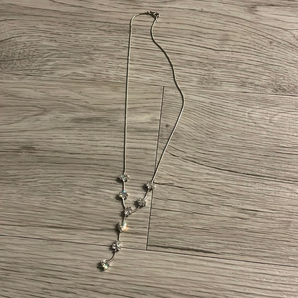 Diamond necklace with heart, spades, and diamonds